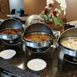 a-buffet-with-many-different-types-of-food-on-it.jpg A buffet with many different types of food on it
